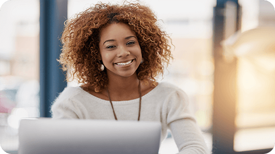 businesswoman-sitting-at-her-laptop